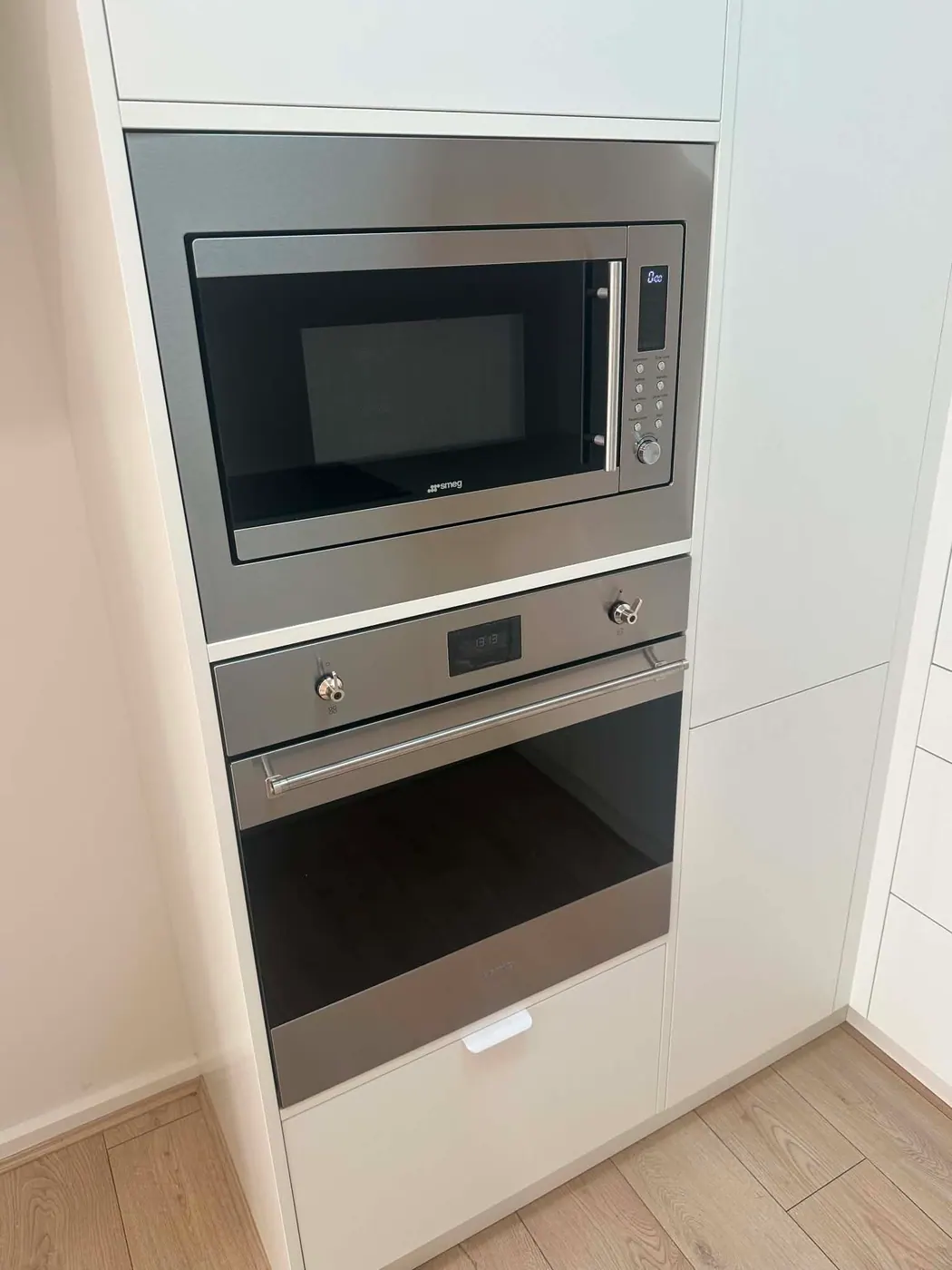 Built-in oven and microwave in a cabinet tower in a renovated Golden Grove kitchen
