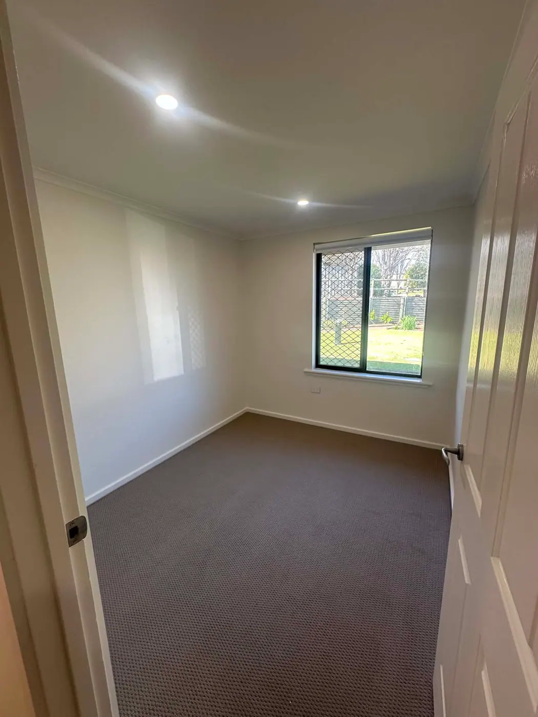 Second room with new LED downlights during a Hope Valley renovation