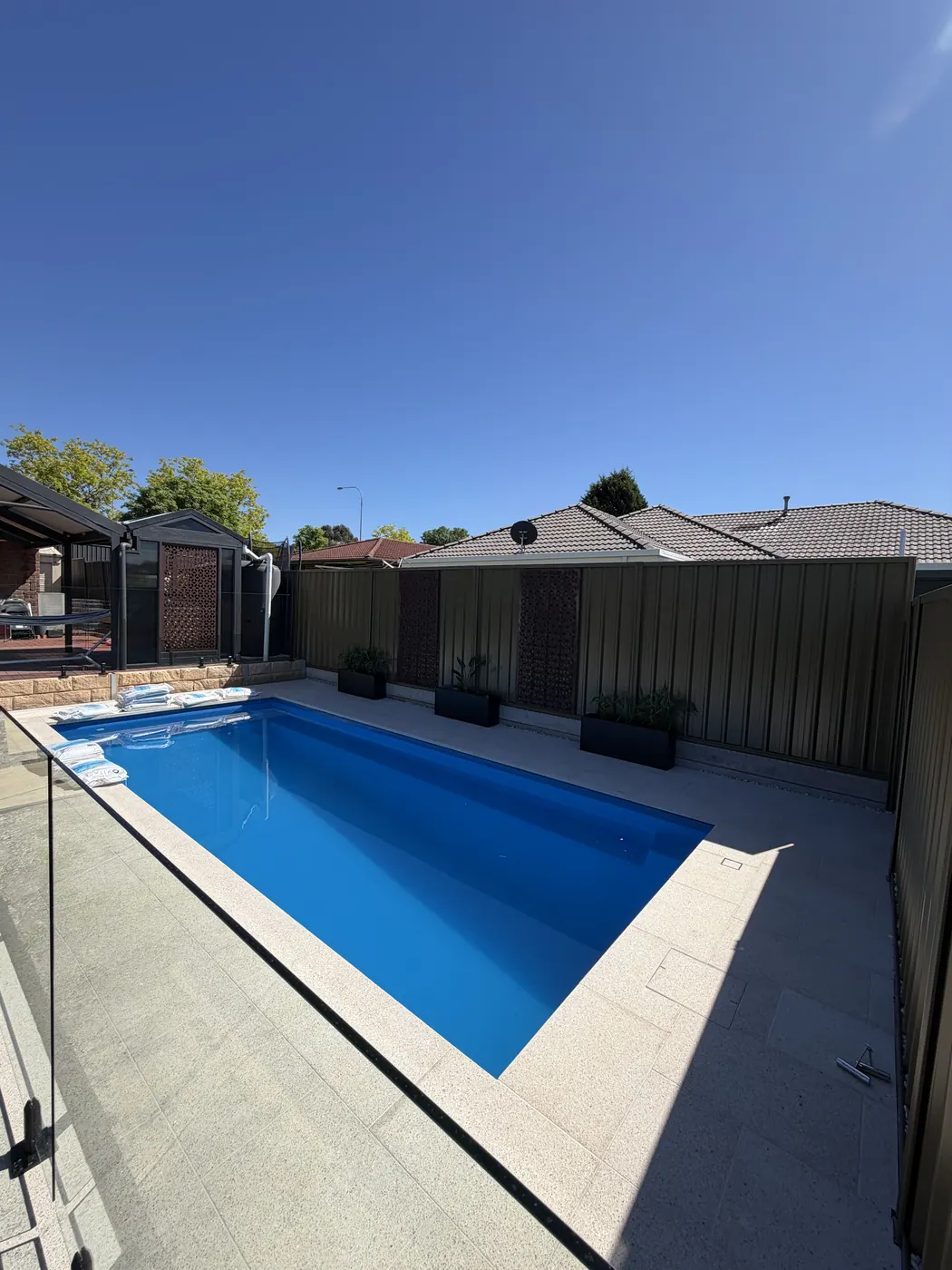 Finished pool in Golden Grove with the equipment station wired and the yard tidy